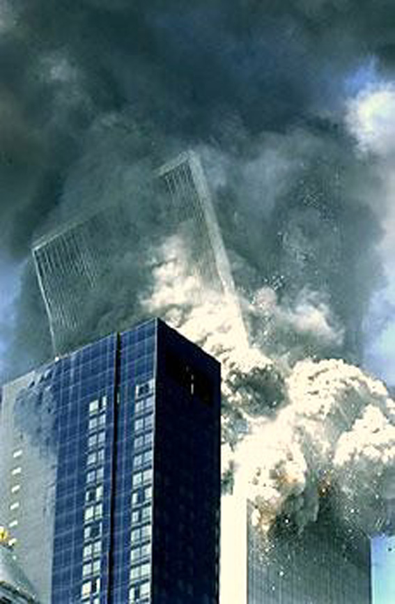 The World Trade Center towers on September 11, 2001, with smoke and debris