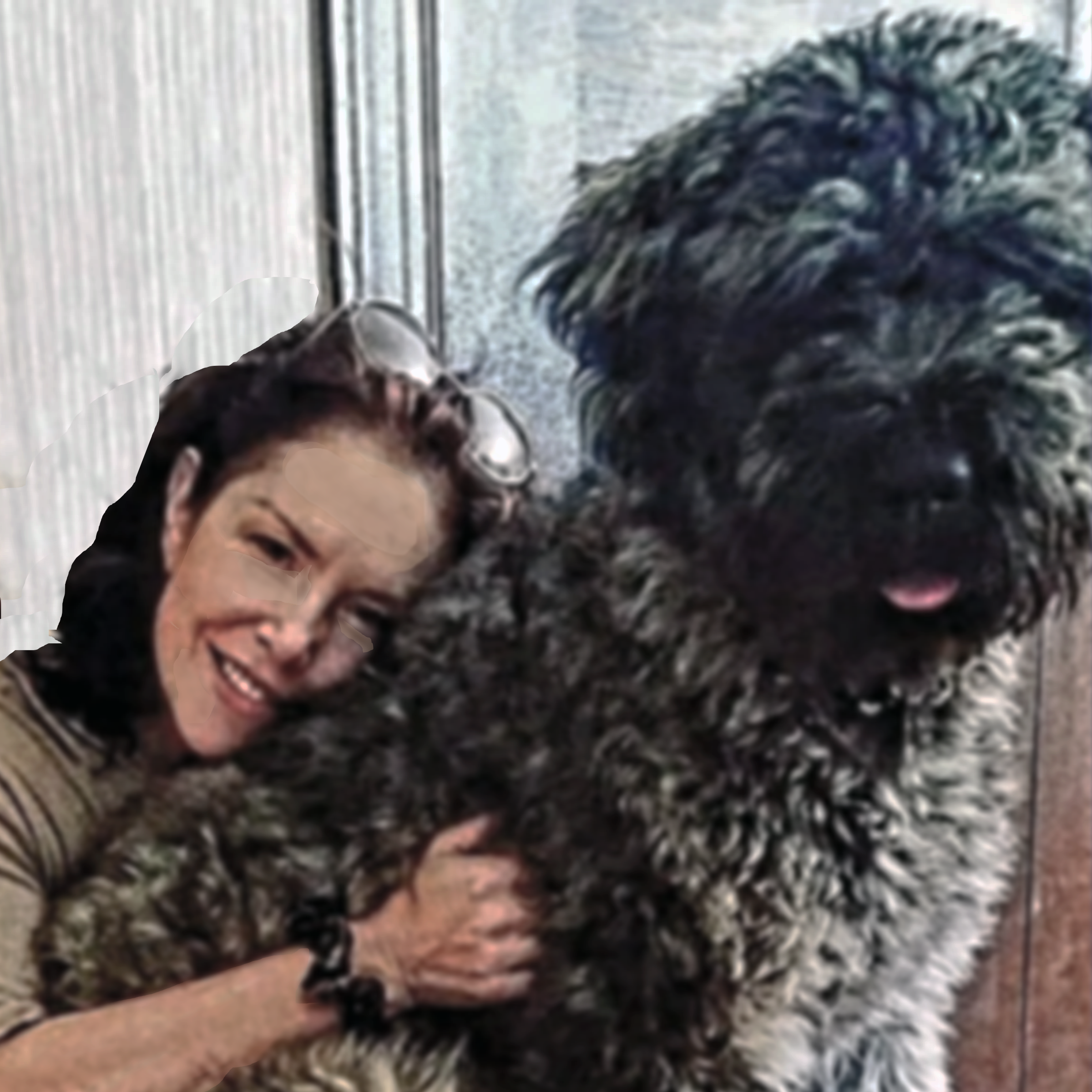 Deirdre hugging Jinjin, a large shaggy dog